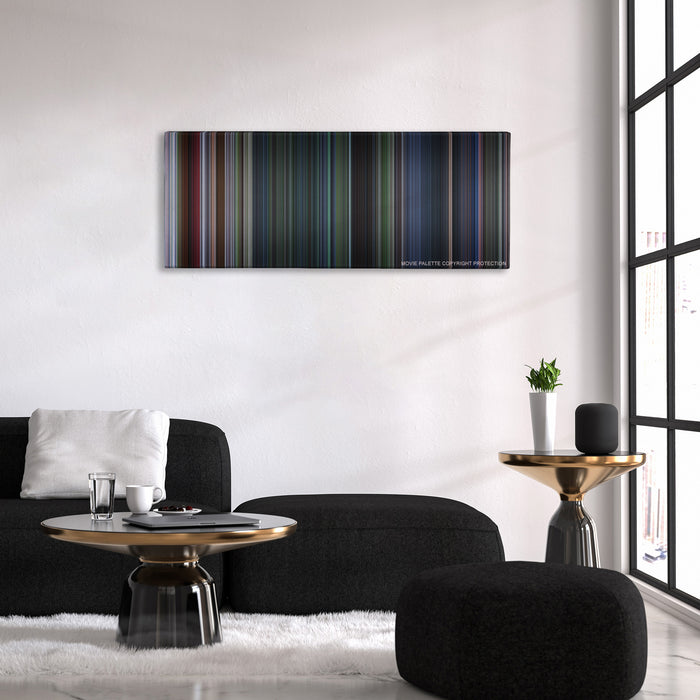 Jurassic Park III color palette canvas above a black sofa with a gold-topped table