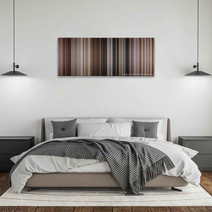 13 Going on 30 color palette canvas above a bed, between two black pendant lamps