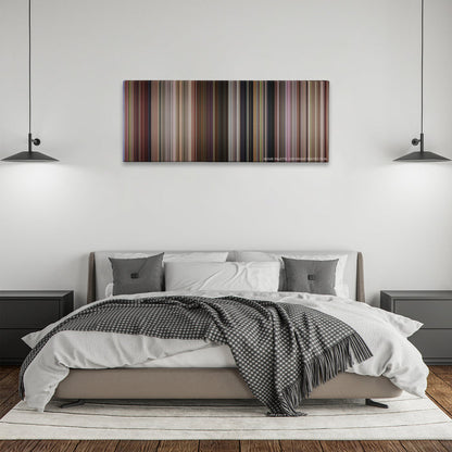 13 Going on 30 color palette canvas above a bed, between two black pendant lamps