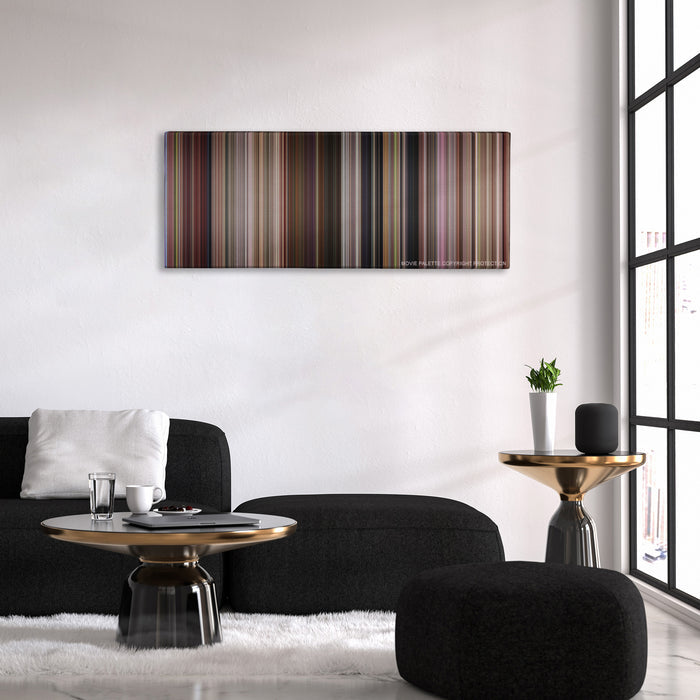 13 Going on 30 color palette canvas above a black sofa with a gold-topped table
