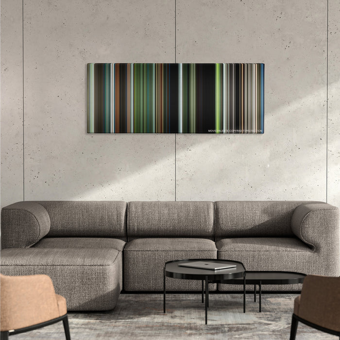 Annihilation color palette canvas on a concrete wall above a gray sectional sofa