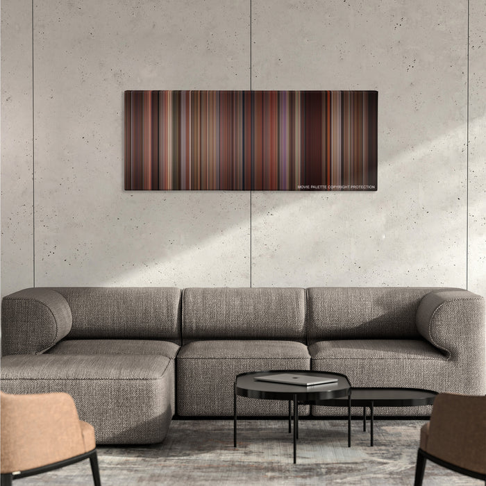 As Good as It Gets color palette canvas on a concrete wall above a gray sectional sofa
