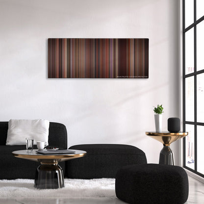 As Good as It Gets color palette canvas above a black sofa with a gold-topped table