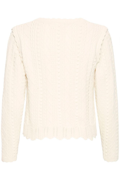 Soft cotton cardigan by Atelier Rêve in a classic birch shade. Easy to layer over dresses and tees for everyday wear. Shop at Dotique.