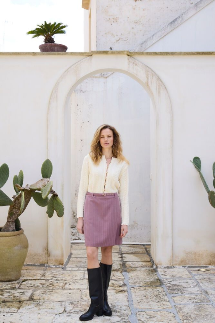 Soft cotton cardigan by Atelier Rêve in a classic birch shade. Easy to layer over dresses and tees for everyday wear. Shop at Dotique.