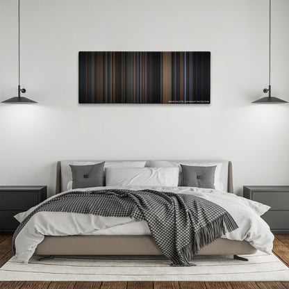 Batman color palette canvas above a bed, between two black pendant lamps