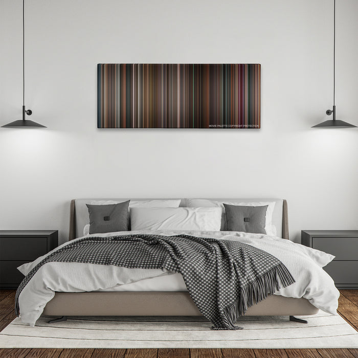 Black Swan color palette canvas above a bed, between two black pendant lamps