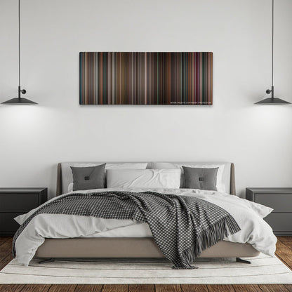 Black Swan color palette canvas above a bed, between two black pendant lamps