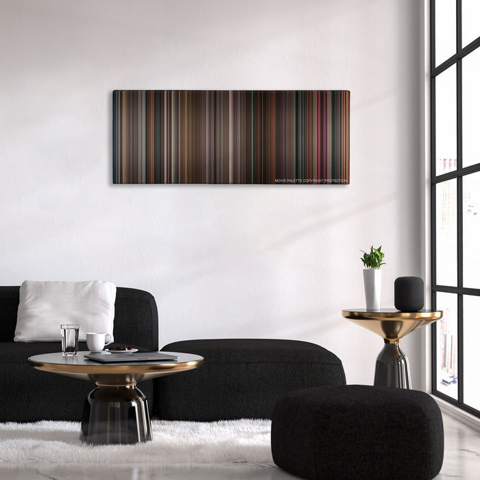 Black Swan color palette canvas above a black sofa with a gold-topped table