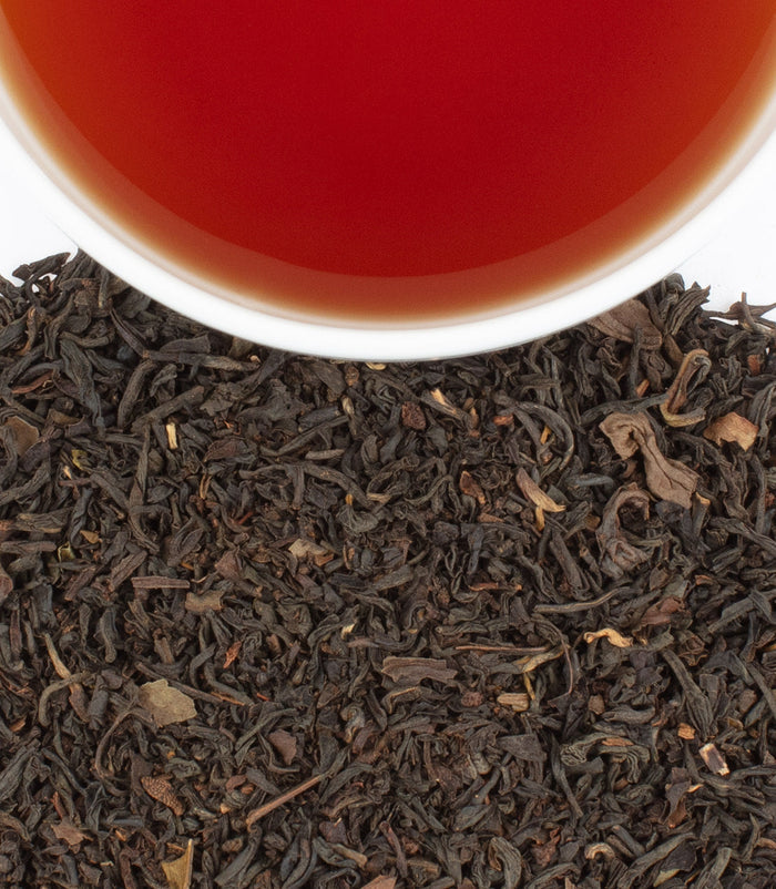 Botanical Blend Earl Grey Tea by Harney & Sons — dry blend beside a brewed cup for illustration; cups are separate