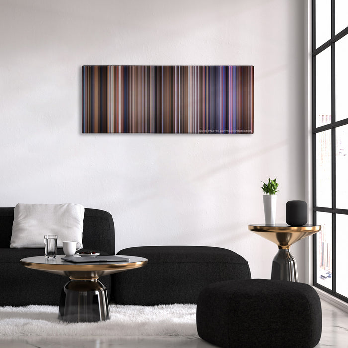 Contact color palette canvas above a black sofa with a gold-topped table