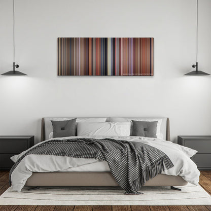 Dumb and Dumber color palette canvas above a bed, between two black pendant lamps