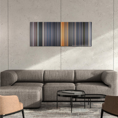 Galaxy Quest color palette canvas on a concrete wall above a gray sectional sofa