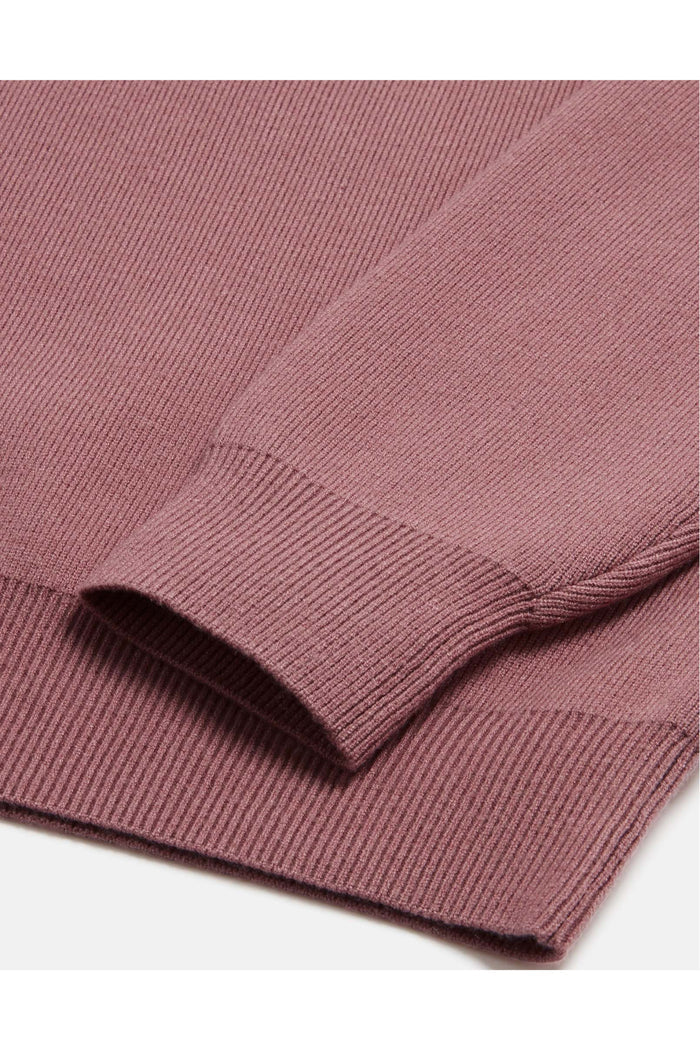 Close-up of sleeve and hem details on Gym+Coffee Knit Crew in Terra Rose, shop Gym+Coffee at Dotique for soft activewear