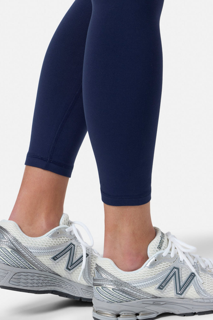 Gym+Coffee Womens Soft Motion Legging 7/8 Twilight Navy styled with sneakers, shop Gym+Coffee at Dotique for comfort and style