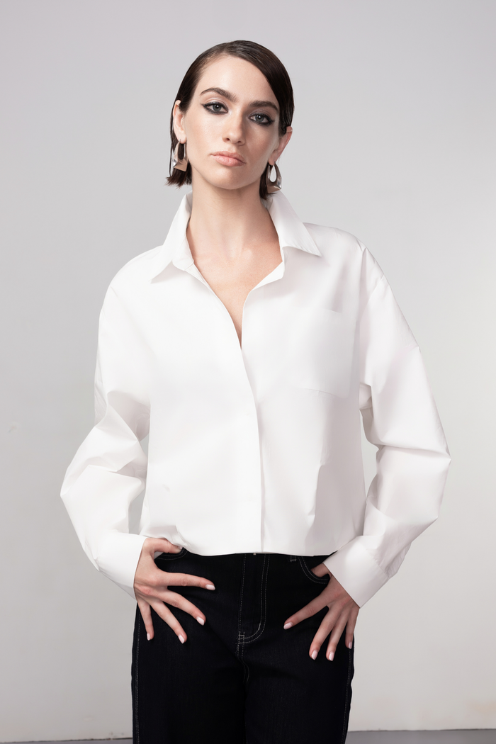 Haako white cotton shirt styled in a modern minimalist outfit at Dotique