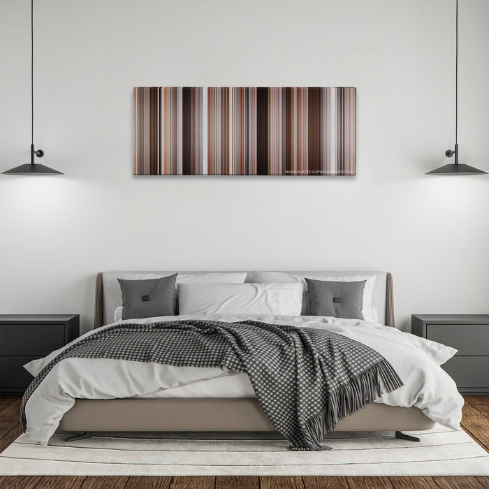 Hitch color palette canvas above a bed, between two black pendant lamps