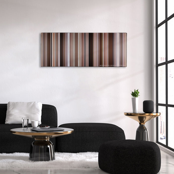 Hitch color palette canvas above a black sofa with a gold-topped table