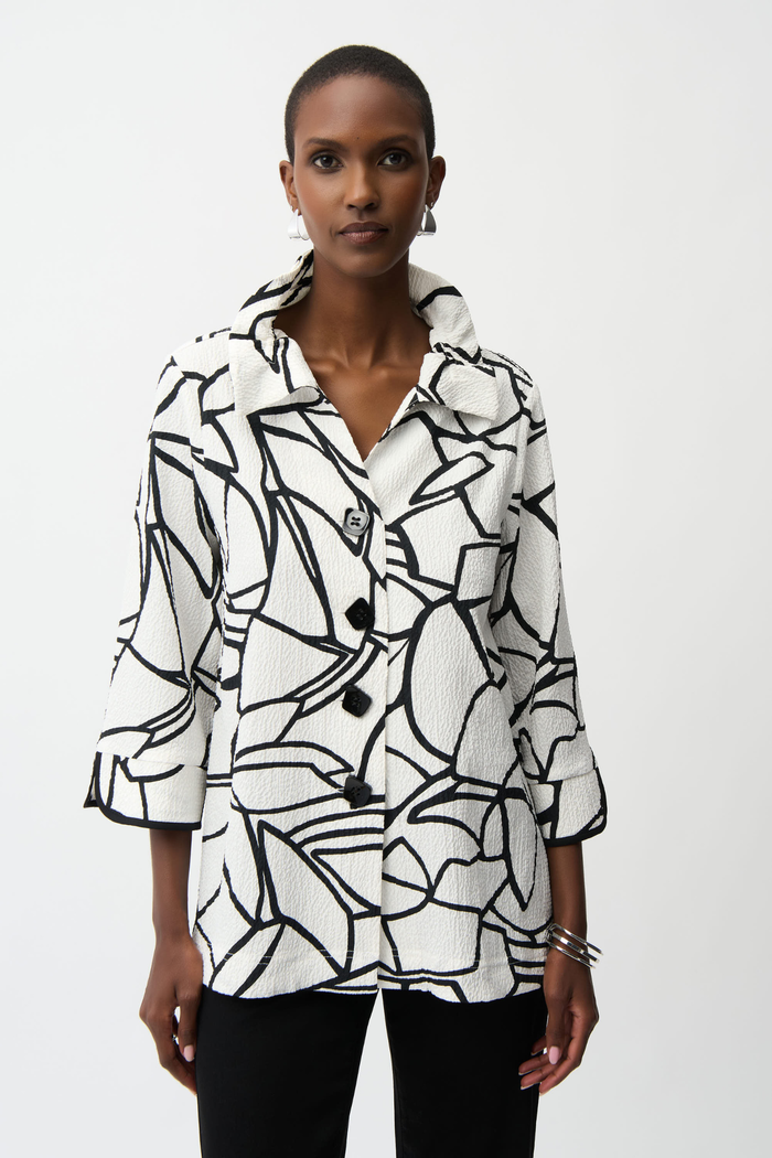 Joseph Ribkoff vanilla and black abstract seersucker trapeze jacket with contrast buttons at Dotique