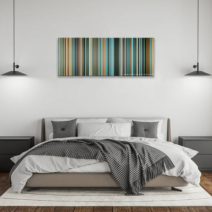 Layer Cake color palette canvas above a bed, between two black pendant lamps