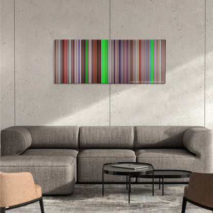 Natural Born Killers color palette canvas on a concrete wall above a gray sectional sofa