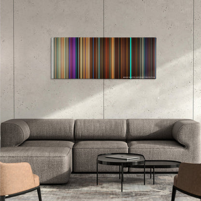 Nerve color palette canvas on a concrete wall above a gray sectional sofa