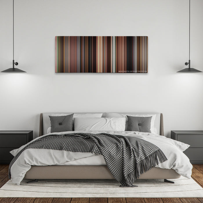 Once color palette canvas above a bed, between two black pendant lamps