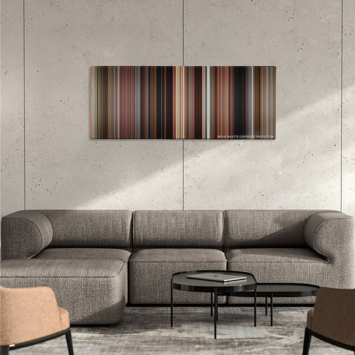 Once color palette canvas on a concrete wall above a gray sectional sofa