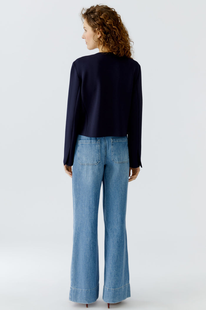 Back view of a woman wearing Oui 96341 Navy Blue Collarless Jacket with Gold Buttons by Oui, shop Oui at Dotique.