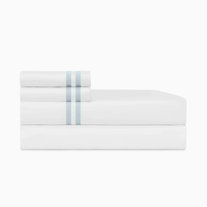 Ribbons Pair of Pillowcases by Home Treasures — folded bedding and cuff detail