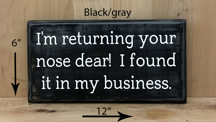 12x6 black/gray funny wood sign with white lettering.
