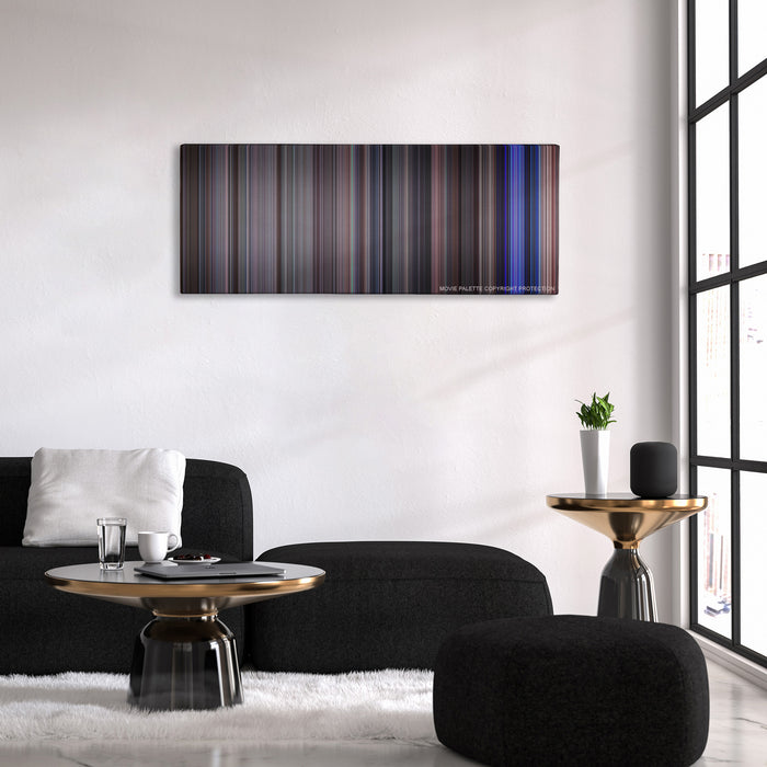 School of Rock color palette canvas above a black sofa with a gold-topped table