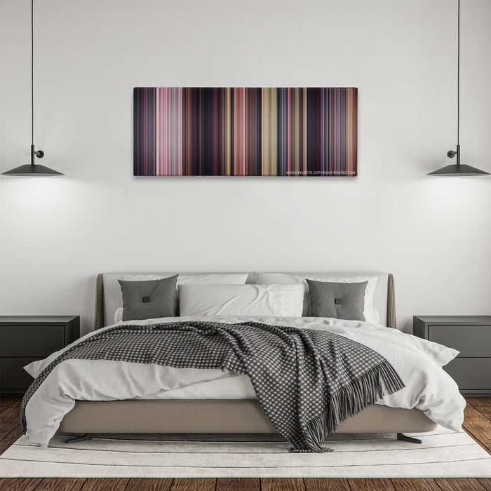 Scooby-Doo color palette canvas above a bed, between two black pendant lamps