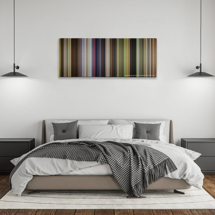 Shrek color palette canvas above a bed, between two black pendant lamps