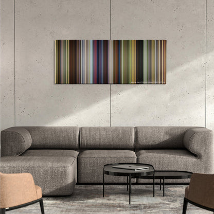 Shrek color palette canvas on a concrete wall above a gray sectional sofa