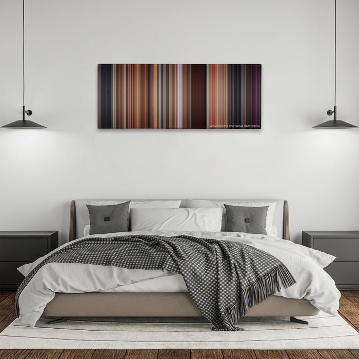 Step Up color palette canvas above a bed, between two black pendant lamps