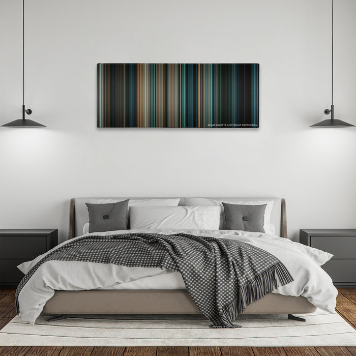 Super 8 color palette canvas above a bed, between two black pendant lamps