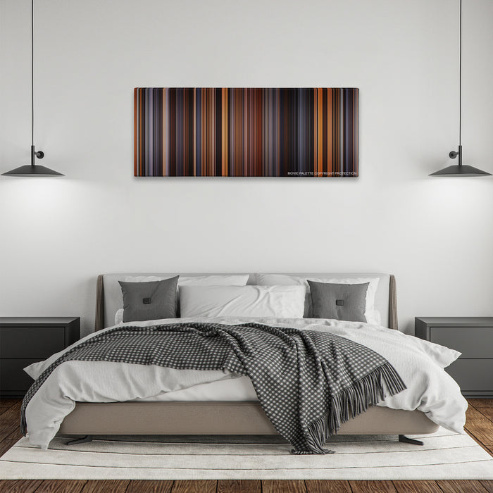 The English Patient color palette canvas above a bed, between two black pendant lamps