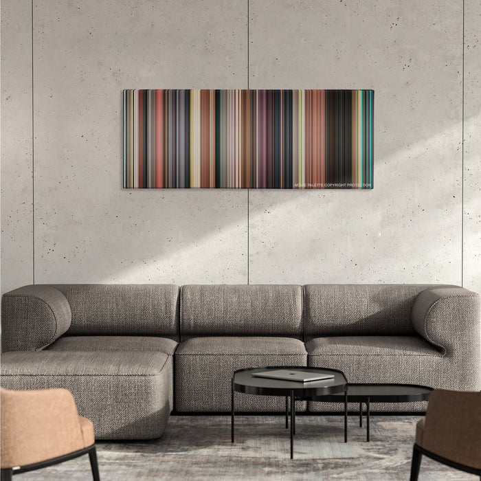 The Great Gatsby color palette canvas on a concrete wall above a gray sectional sofa