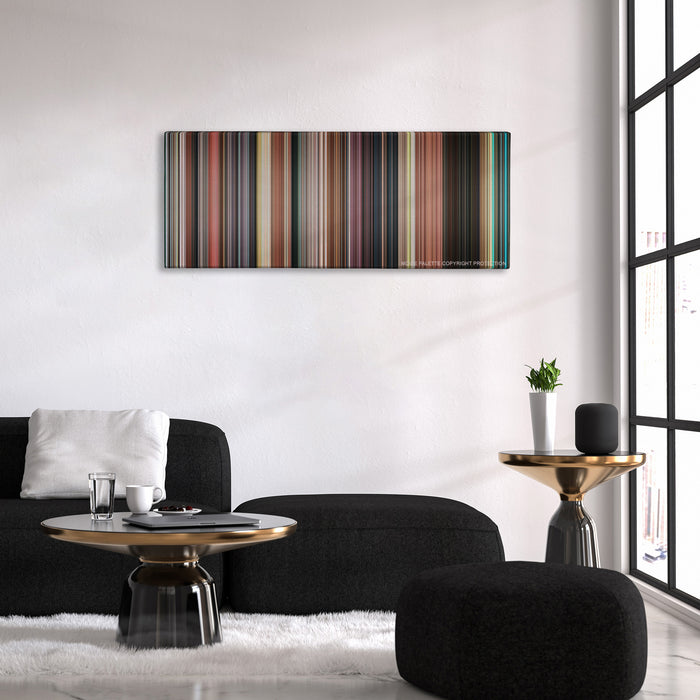 The Great Gatsby color palette canvas above a black sofa with a gold-topped table