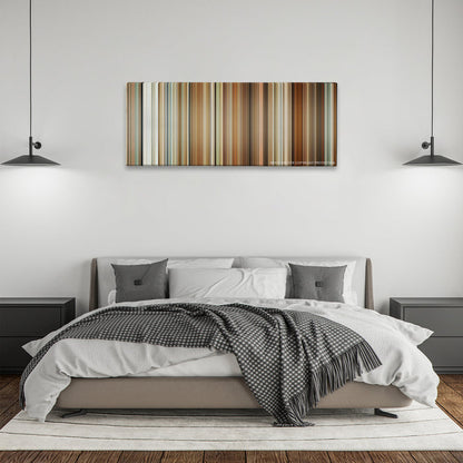 The Holiday color palette canvas above a bed, between two black pendant lamps