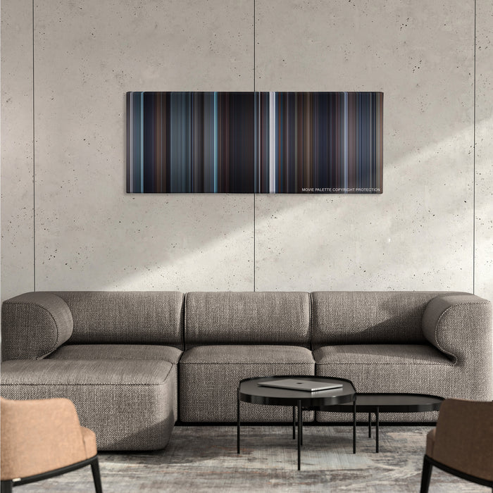 The King's Speech color palette canvas on a concrete wall above a gray sectional sofa