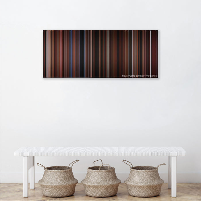 The Lost Boys color palette canvas above a white bench with three woven baskets