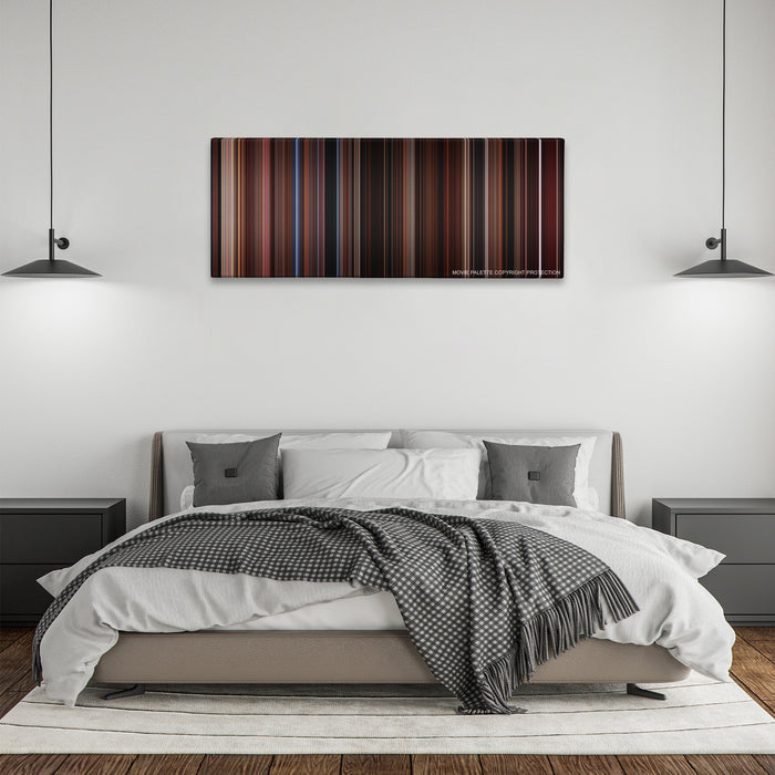The Lost Boys color palette canvas above a bed, between two black pendant lamps