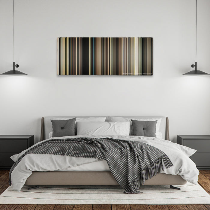 The Master color palette canvas above a bed, between two black pendant lamps