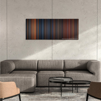 The Polar Express color palette canvas on a concrete wall above a gray sectional sofa