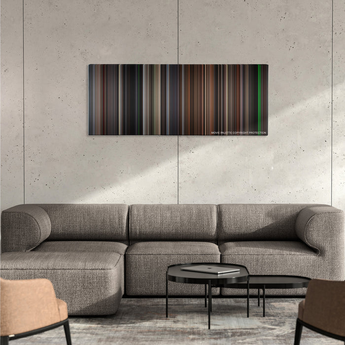 The Silence of the Lambs color palette canvas on a concrete wall above a gray sectional sofa