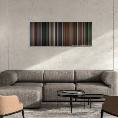 The Silence of the Lambs color palette canvas on a concrete wall above a gray sectional sofa