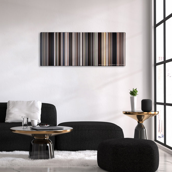 There Will Be Blood color palette canvas above a black sofa with a gold-topped table