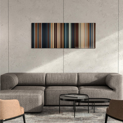 Thor color palette canvas on a concrete wall above a gray sectional sofa